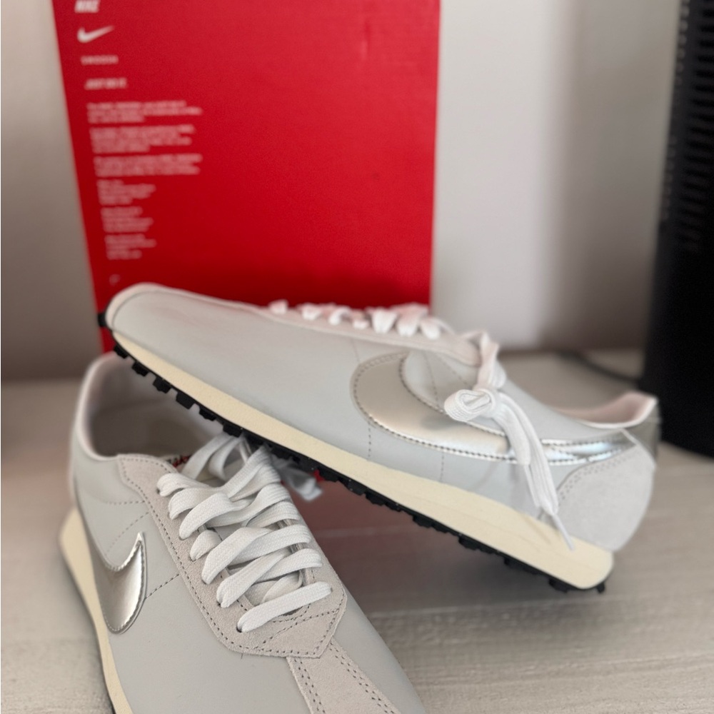 Nike Men’s White Sneakers with Silver Swoosh and Black Outsole